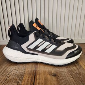 LIKE NEW Adidas COLD.RDY athletic shoes. Black and White with orange accents.